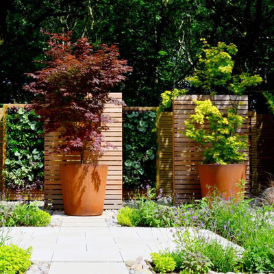 กล่องเครื่องปลูกแบบวงกลมเหล็ก Corten ขนาดใหญ่ OEM ODM พร้อมระบบป้องกันความเป็นส่วนตัว